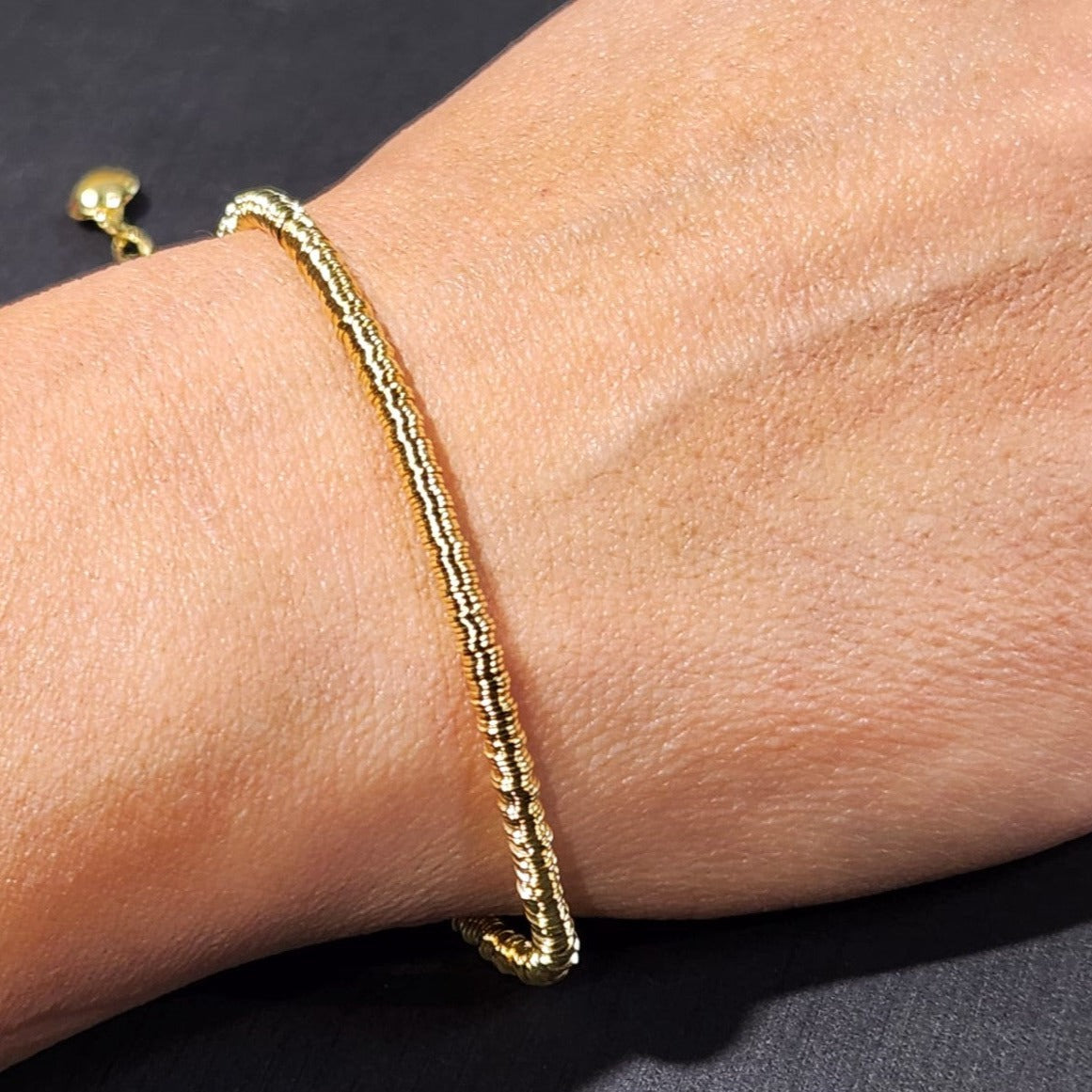 PULSERA DE MOSTACILLAS ARGOLLAS