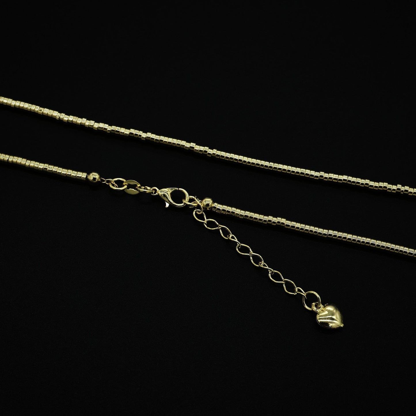 CAMO03 COLLAR DE MOSTACILLAS TUBO 45 CM DORADO