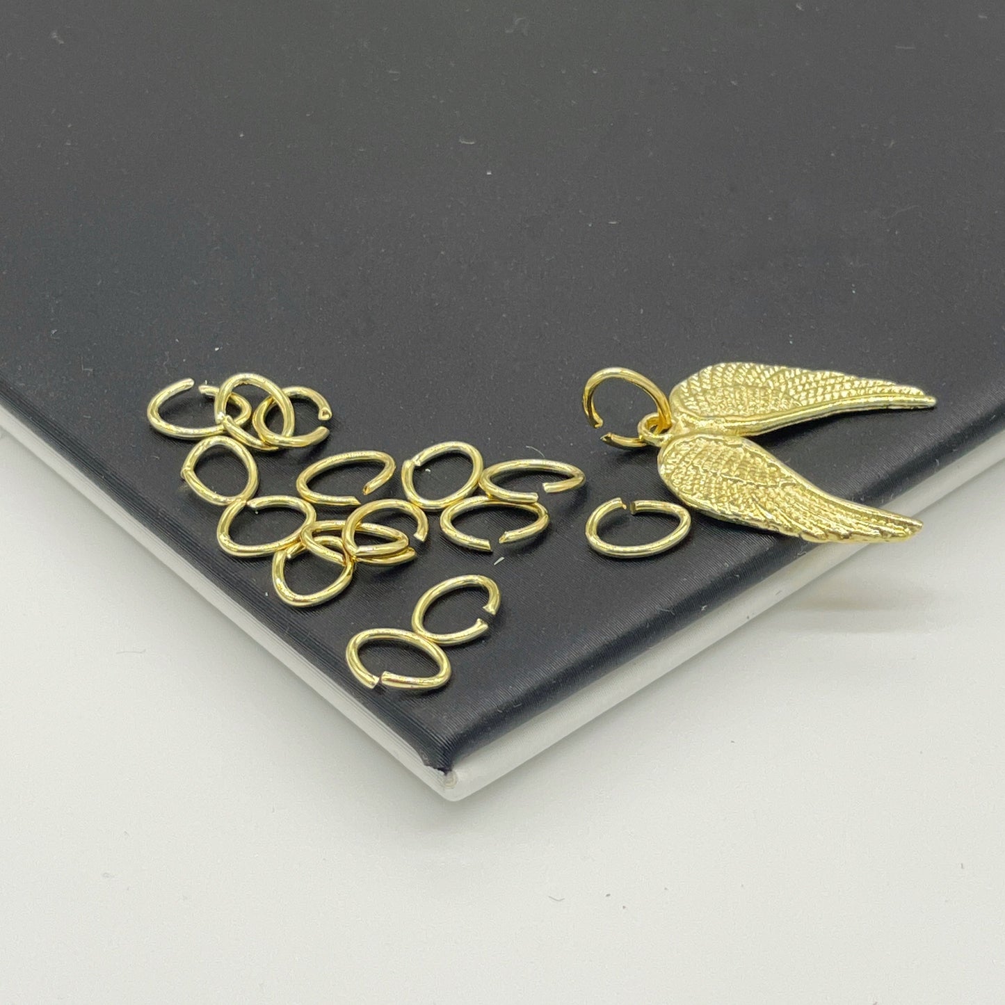 ARGOLLAS DE UNION OVALADAS 5 x 7 MM DORADAS