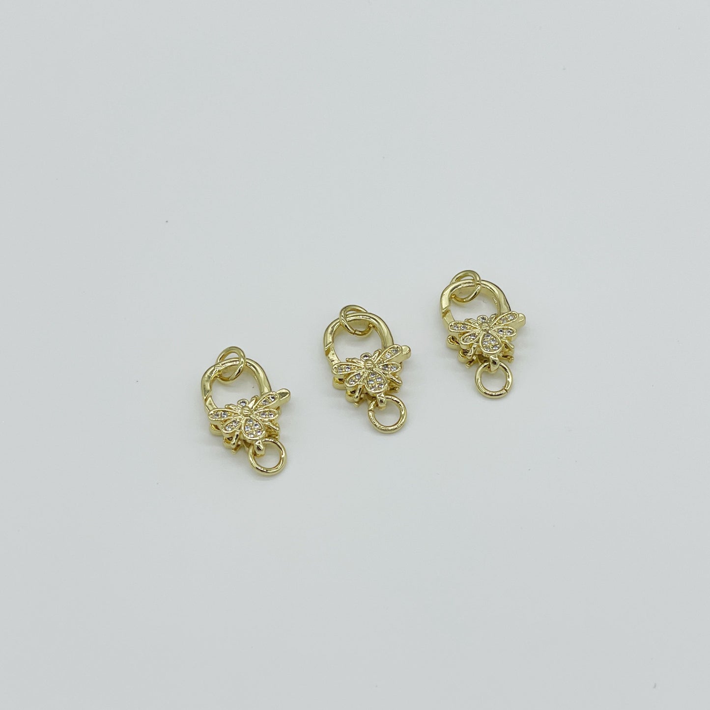 BR59D - BROCHE MARIPOSA CON CIRCONES