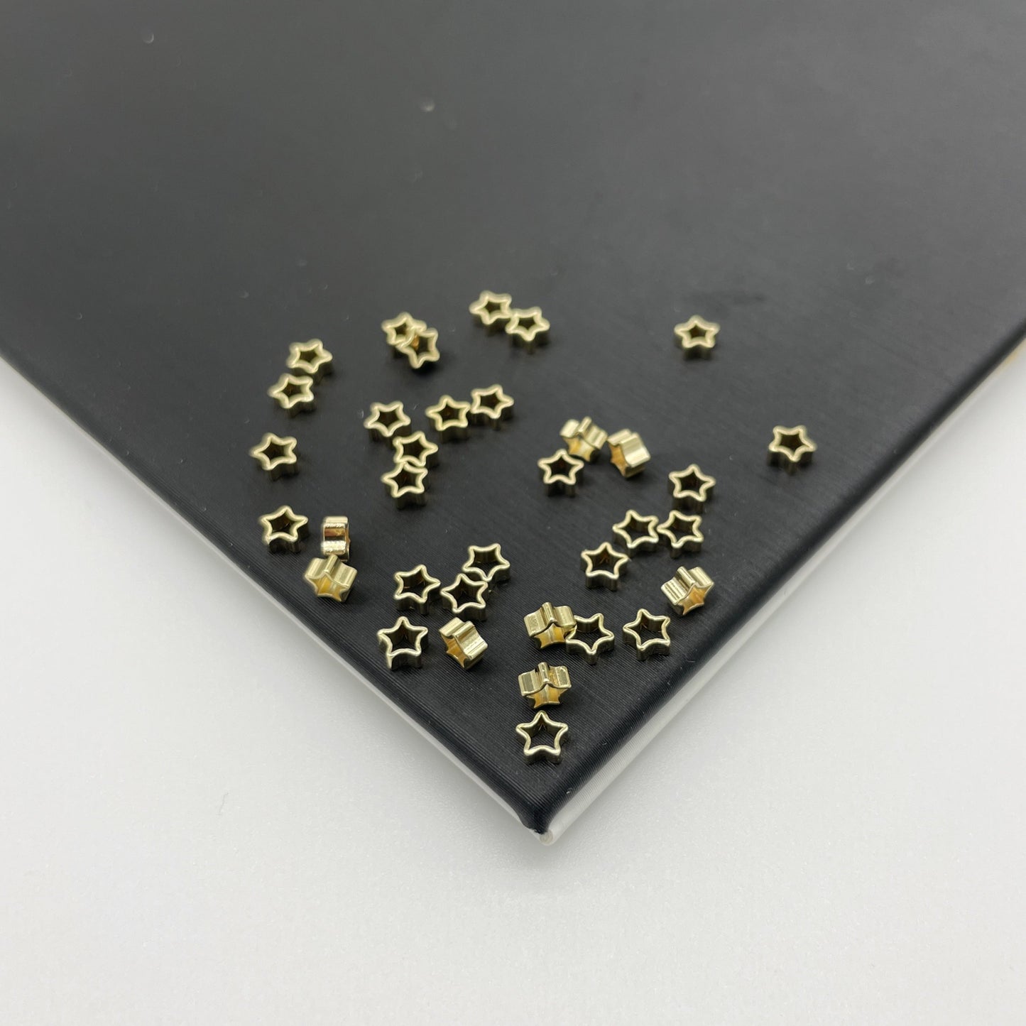 MOSTACILLA SEPARADOR ESTRELLA 3 x 1.5 MM DORADAS
