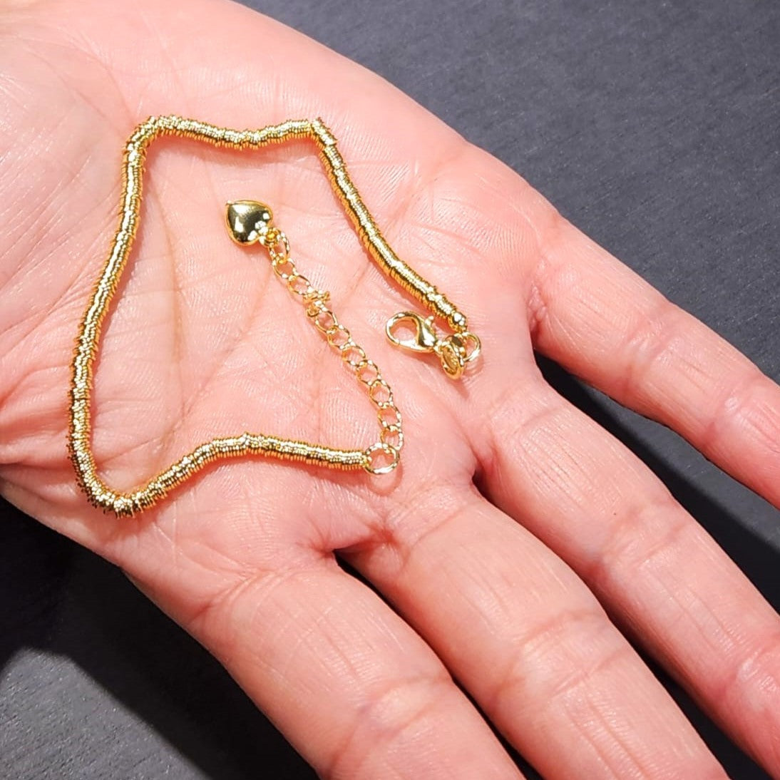 PULSERA DE MOSTACILLAS ARGOLLAS