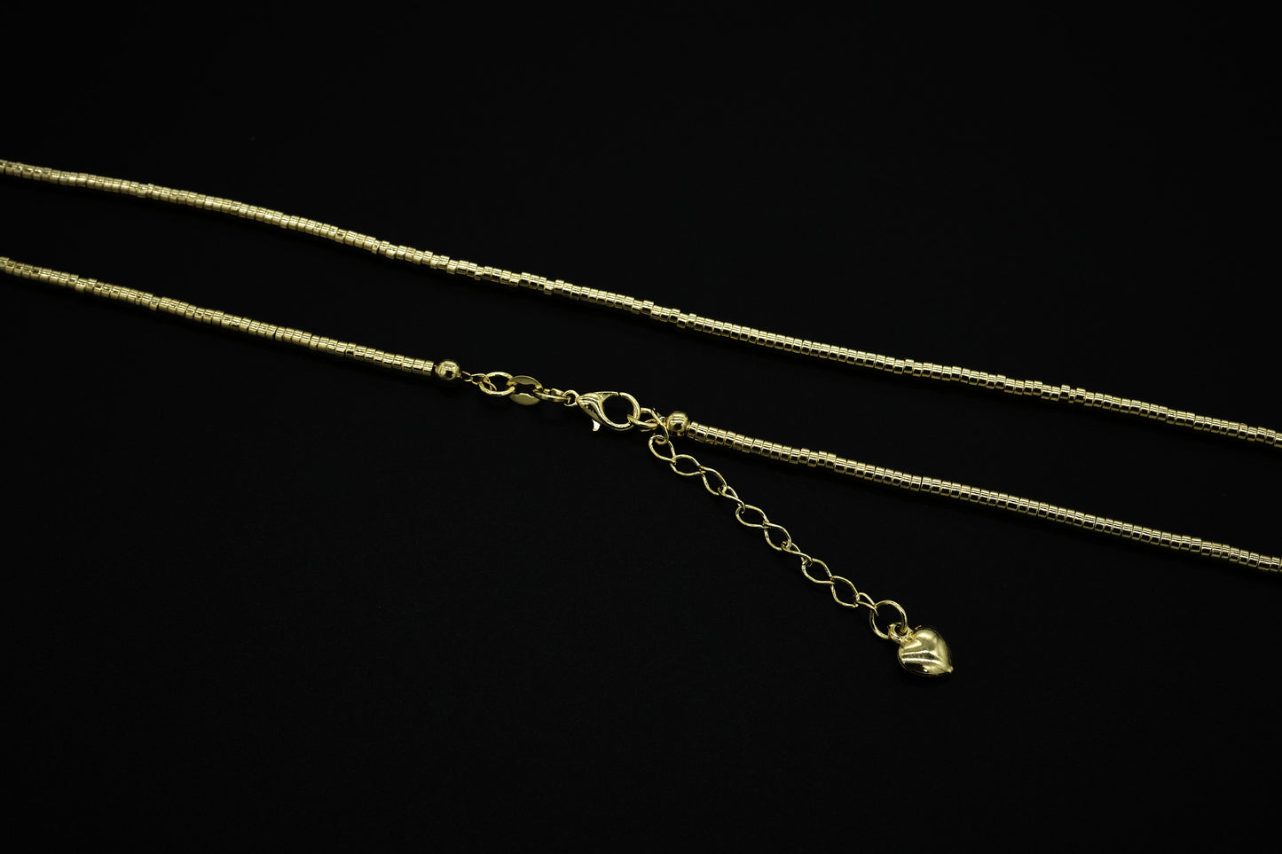 CAMO02 COLLAR MOSTACILLA TUBO 80 CM DORADO