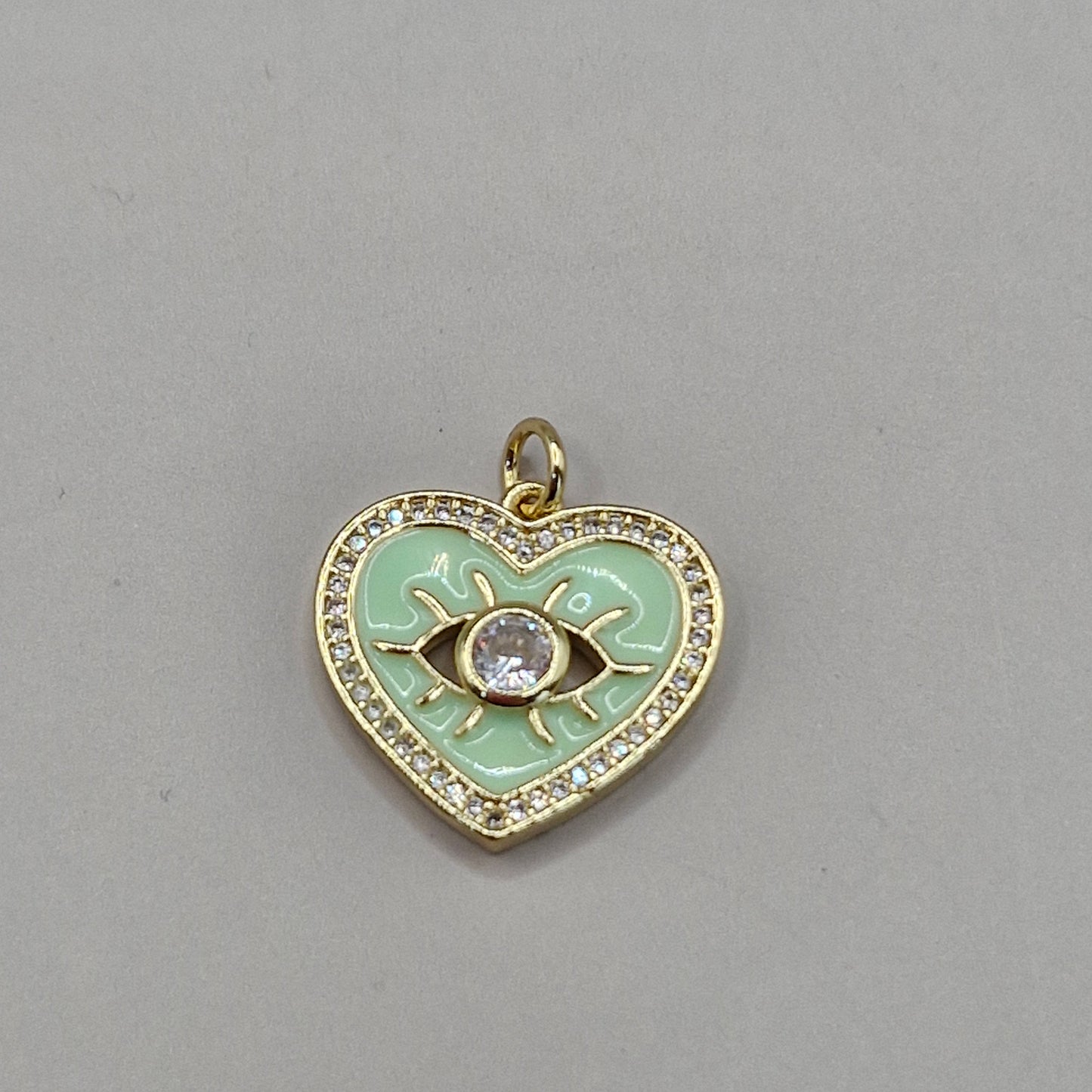 Colgante corazon ojo circon