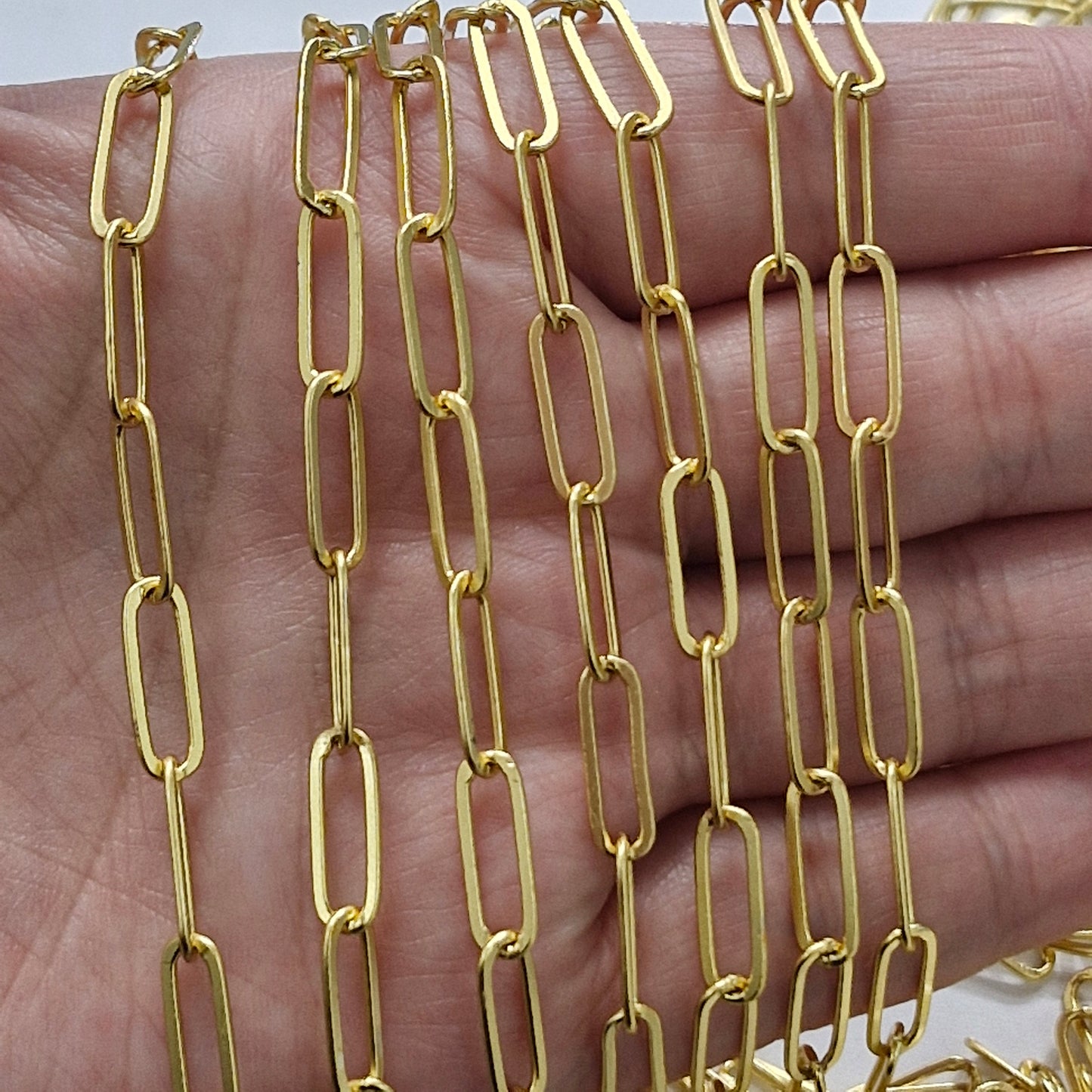 Cadena dorada eslabon clip delgado