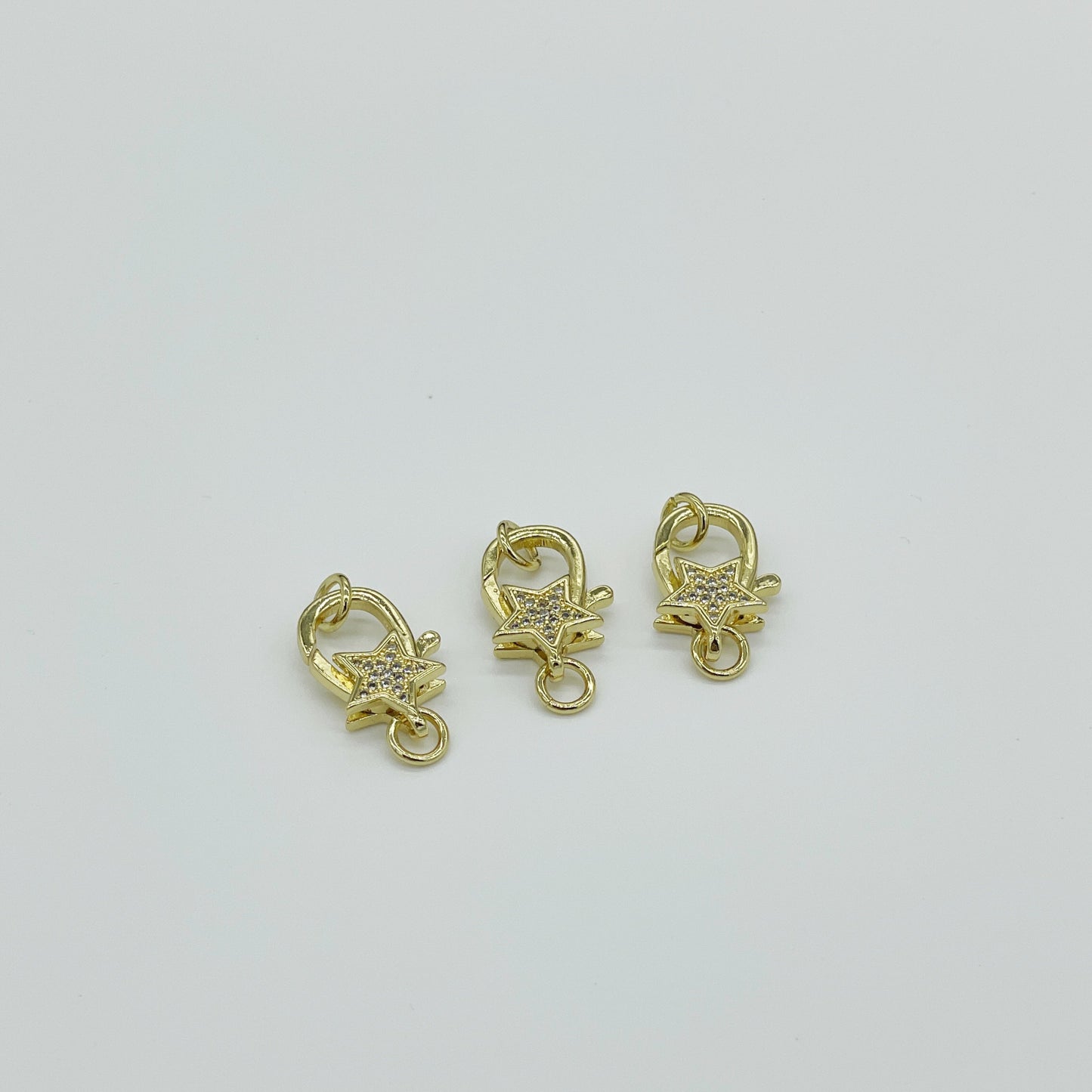 BR56D - BROCHE ESTRELLA CON CIRCONES